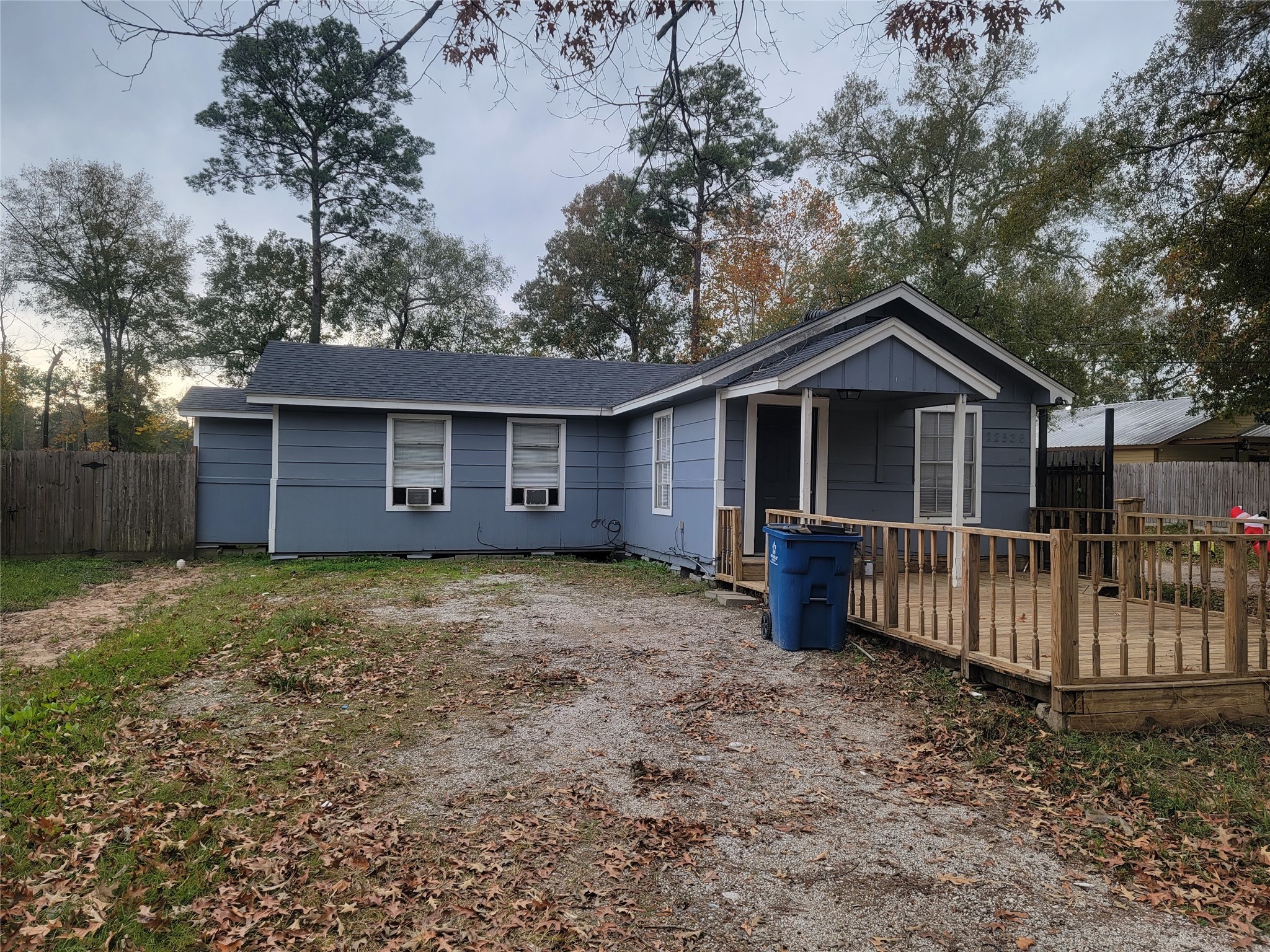 22536 Yancy Road Porter, TX 77365 - Photo 38 of 50 a view of a house with a yard and wooden fence