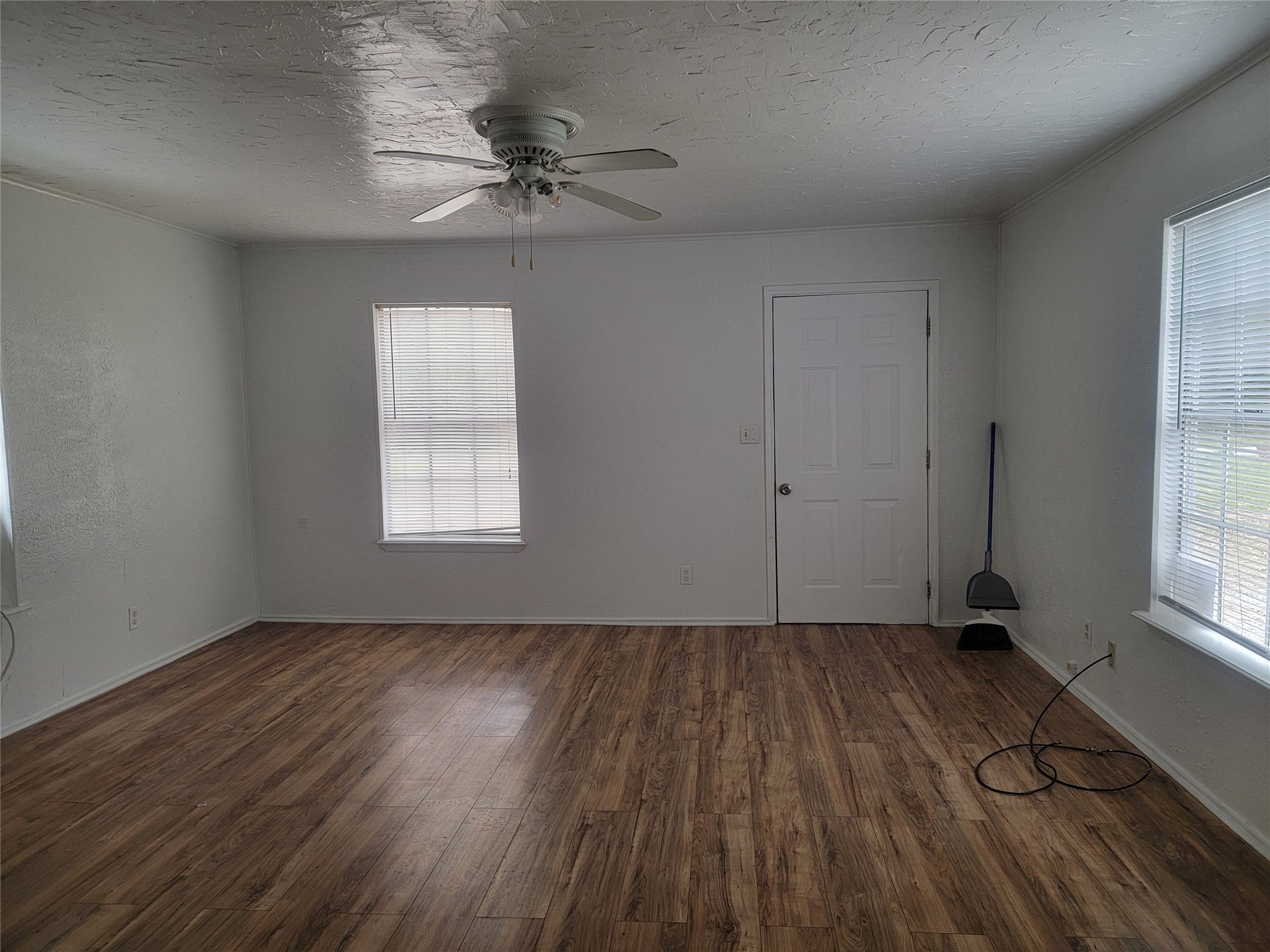 22536 Yancy Road Porter, TX 77365 - Photo 40 of 50 a view of an empty room with a window and wooden floor