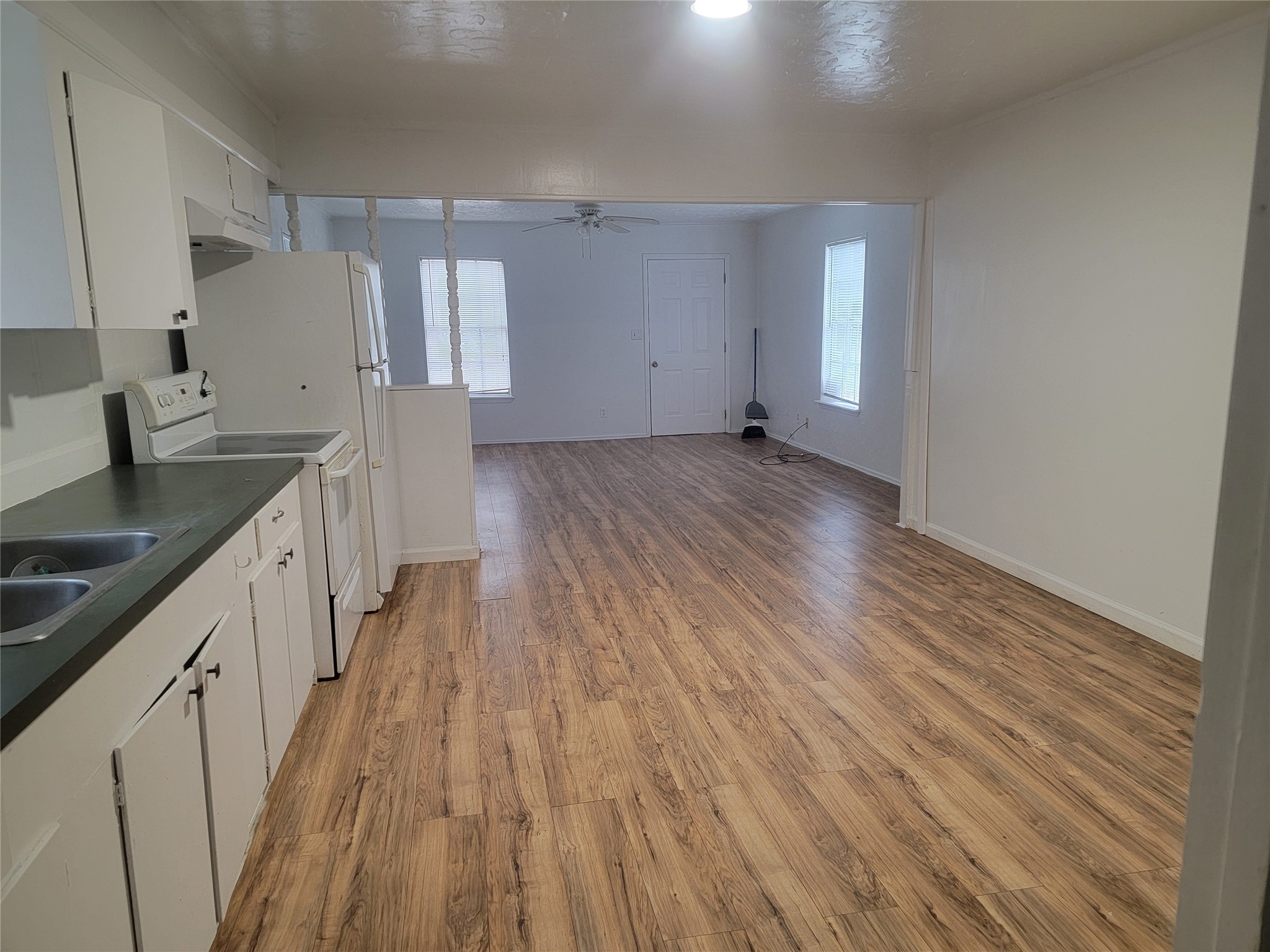 22536 Yancy Road Porter, TX 77365 - Photo 43 of 50 a view of a kitchen with wooden floor and electronic appliances