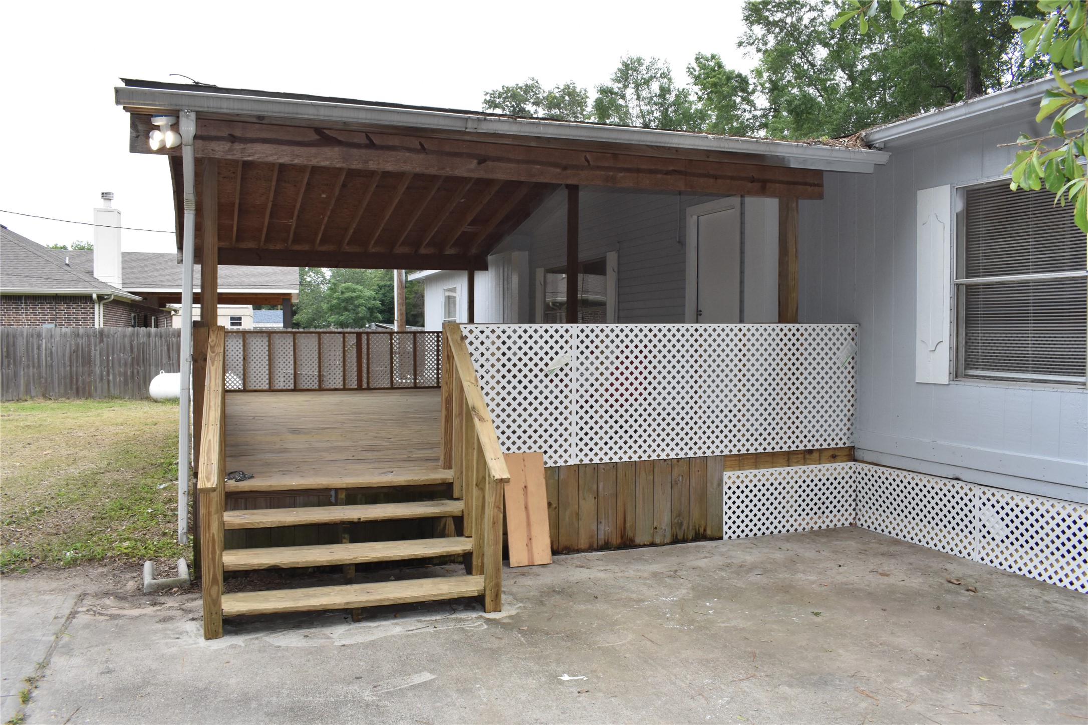 22536 Yancy Road Porter, TX 77365 - Photo 5 of 50 a view of backyard with deck and outdoor seating