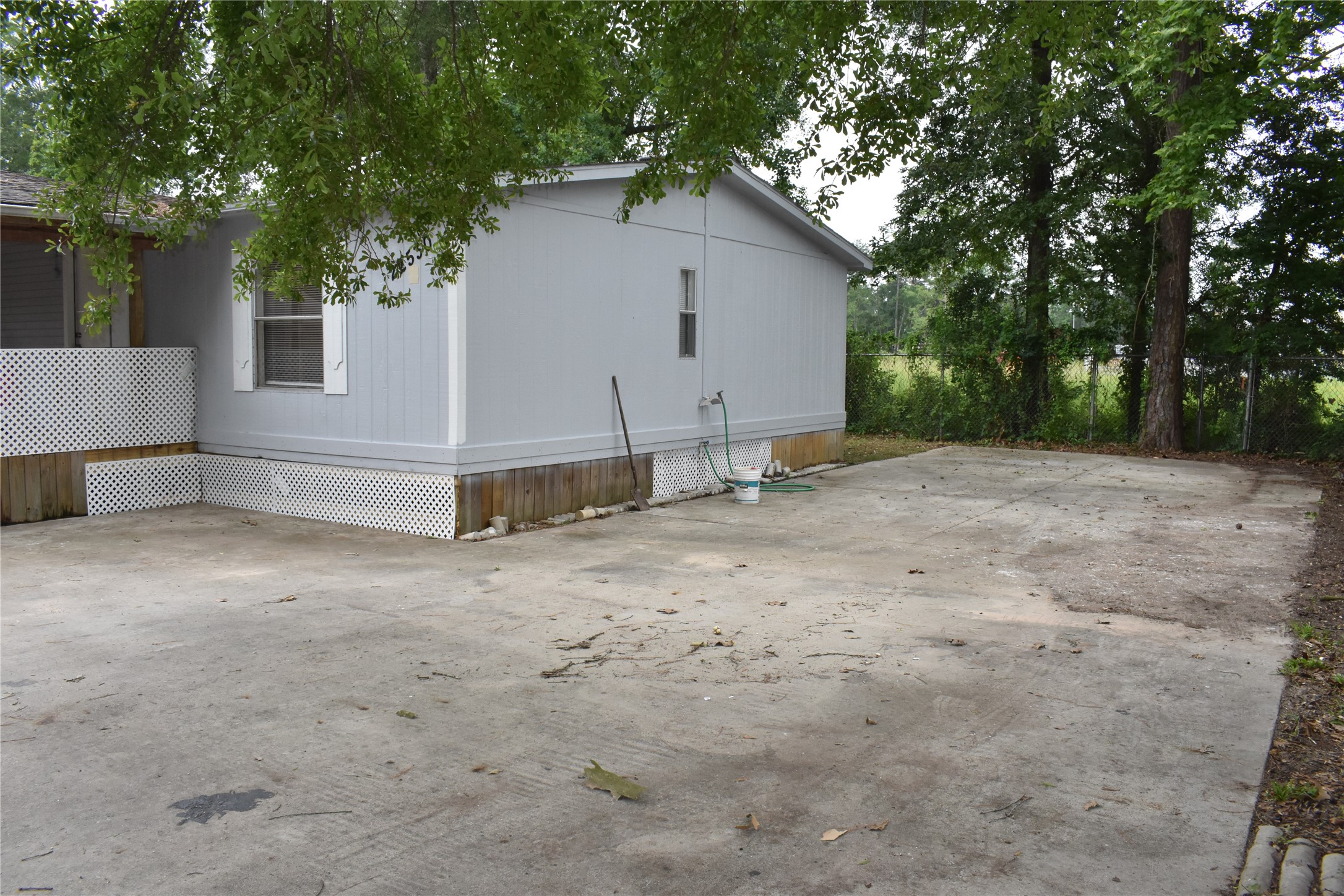22536 Yancy Road Porter, TX 77365 - Photo 10 of 50 a view of backyard with large trees