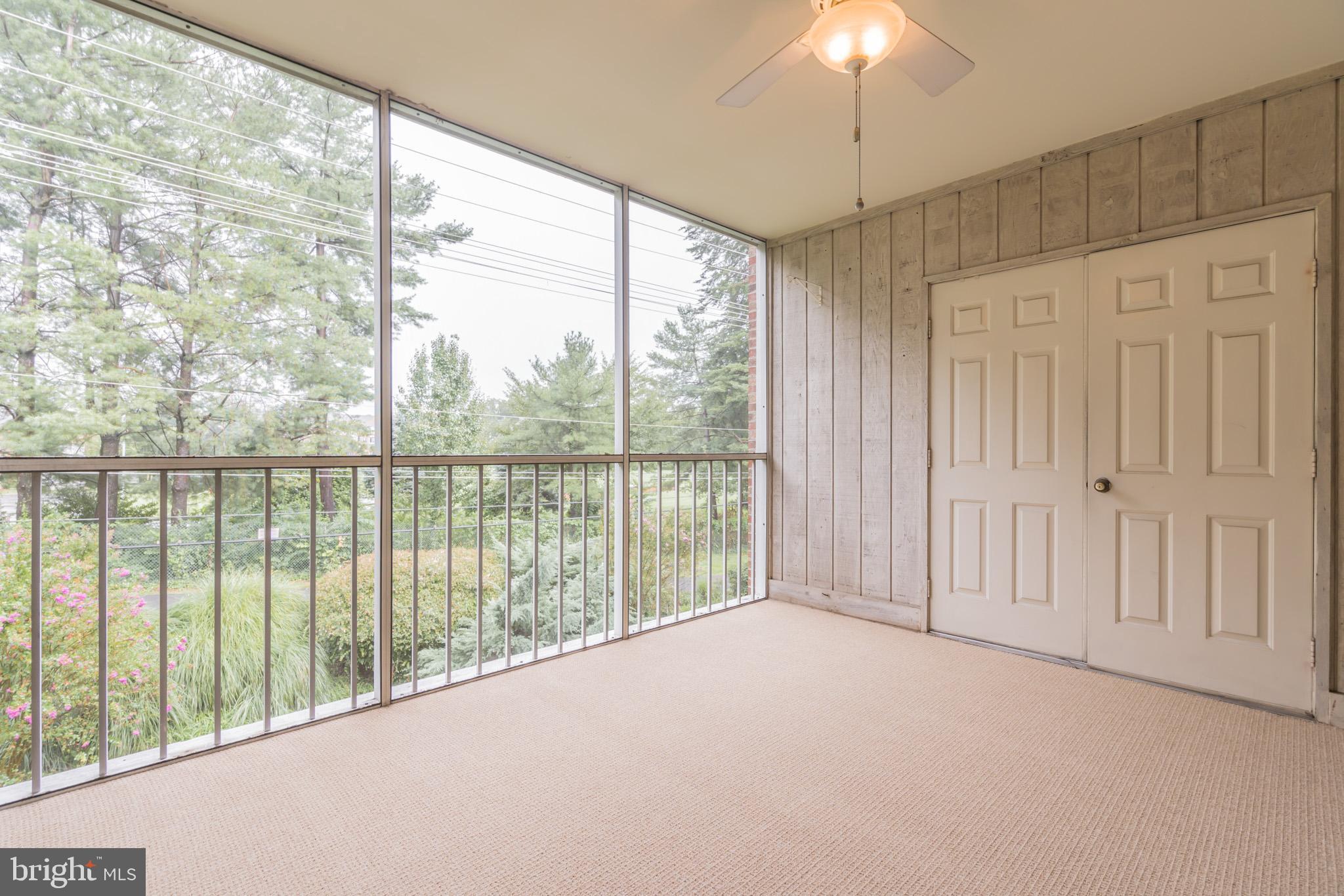 10717 Kings Riding Way, Unit 202 Rockville, MD 20852 - Photo 16 of 34 Porch overlooking Bethesda Trolley Trail