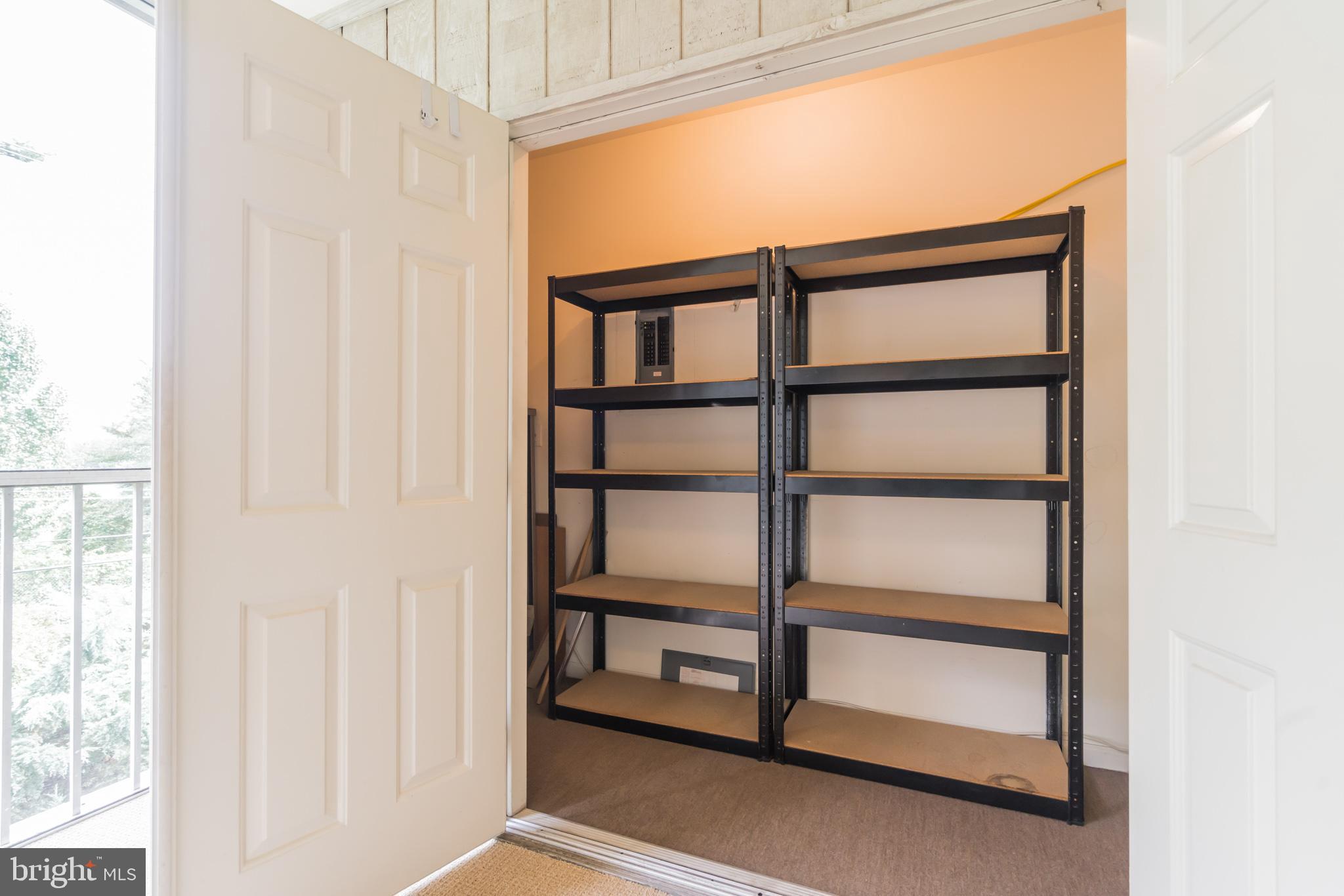 10717 Kings Riding Way, Unit 202 Rockville, MD 20852 - Photo 18 of 34 Walk in storage closet on the porch
