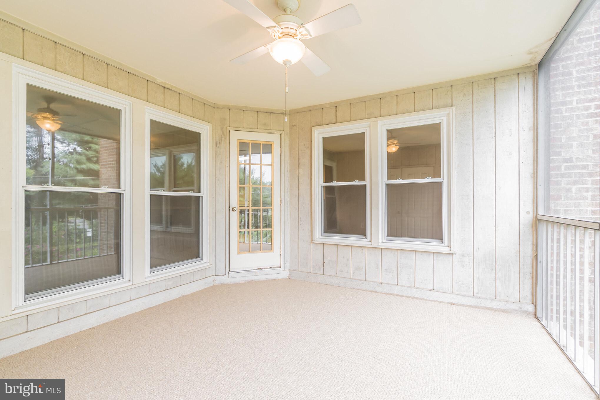 10717 Kings Riding Way, Unit 202 Rockville, MD 20852 - Photo 19 of 34 Awesome breezes on the screened porch