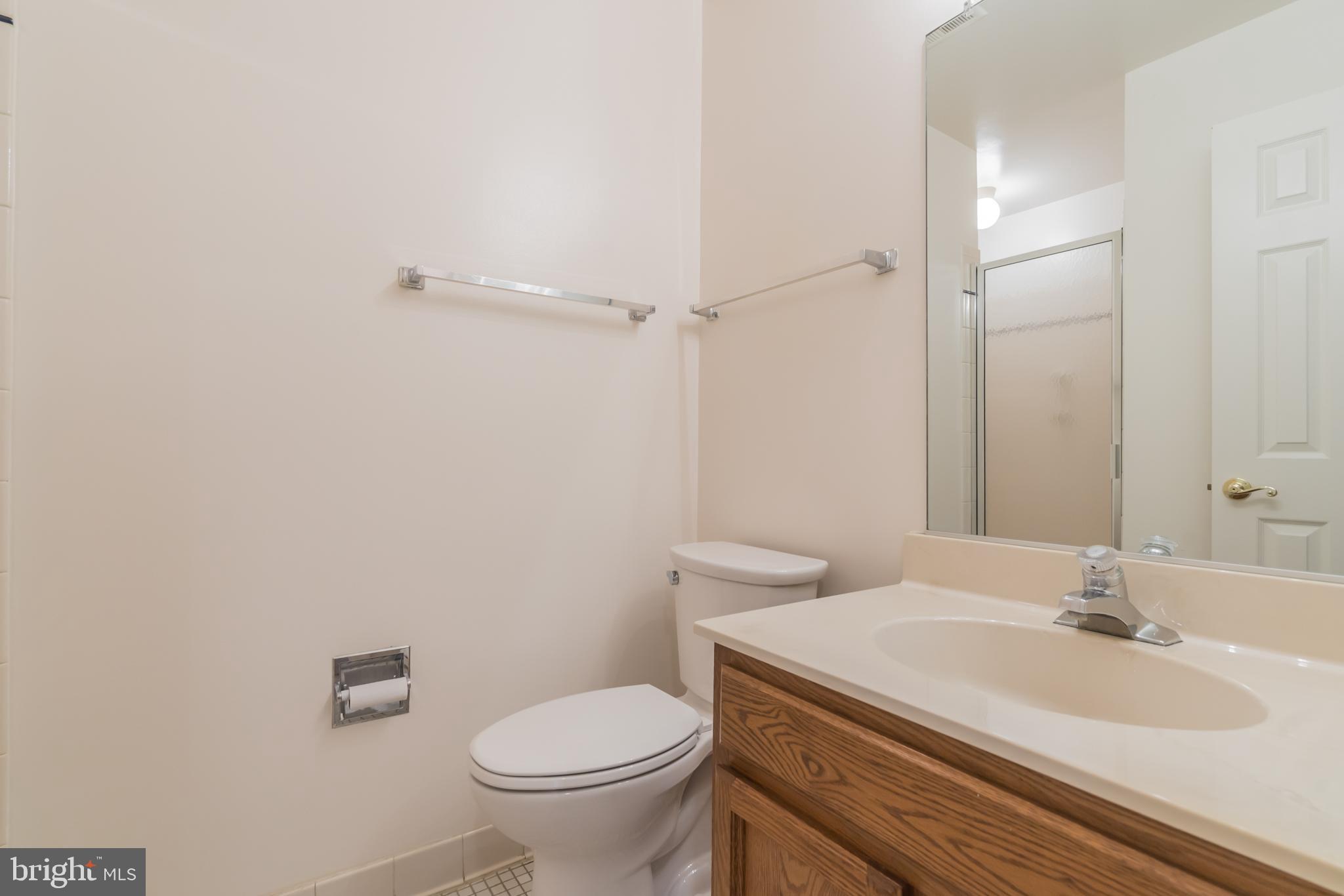 10717 Kings Riding Way, Unit 202 Rockville, MD 20852 - Photo 28 of 34 Second full bathroom with large shower