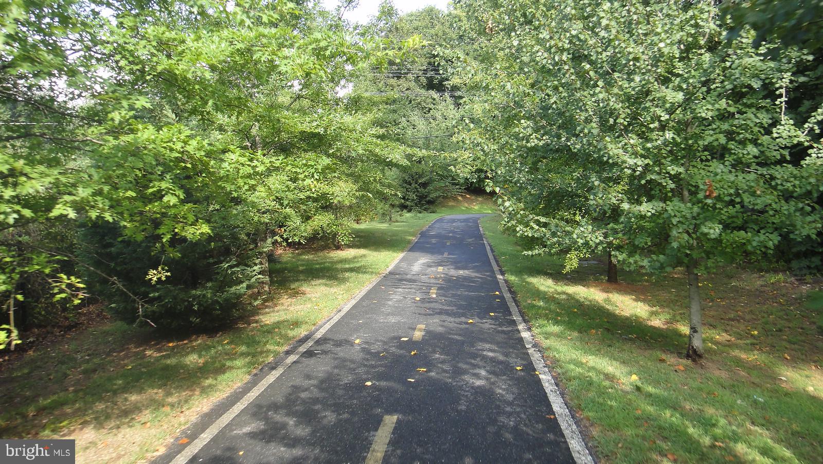10717 Kings Riding Way, Unit 202 Rockville, MD 20852 - Photo 30 of 34 Bethesda Trolley Trail - right behind the building