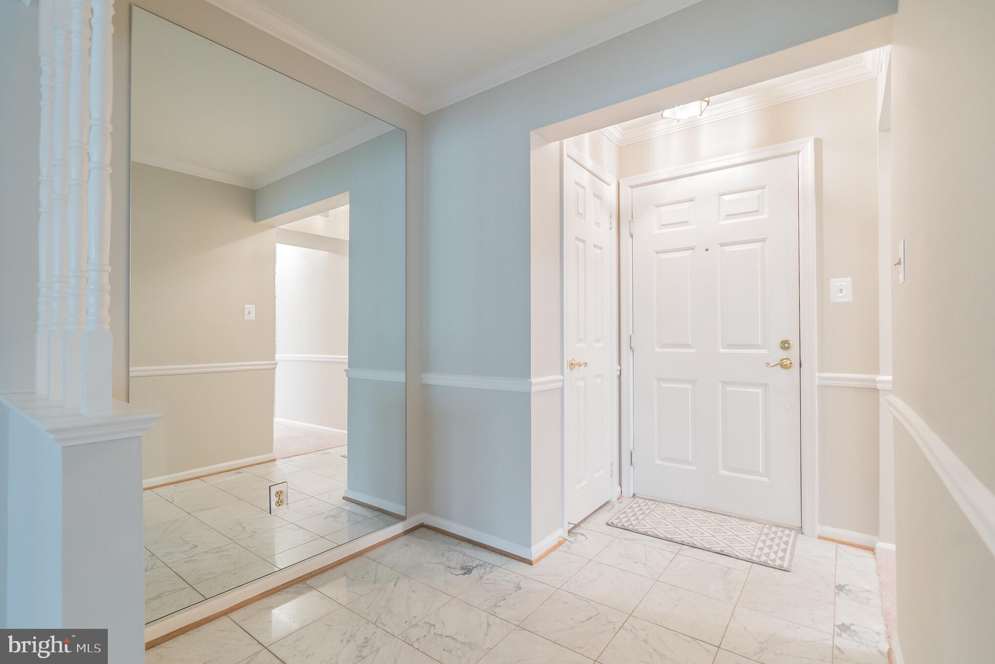 10717 Kings Riding Way, Unit 202 Rockville, MD 20852 - Photo 4 of 34 Entry foyer with coat closet