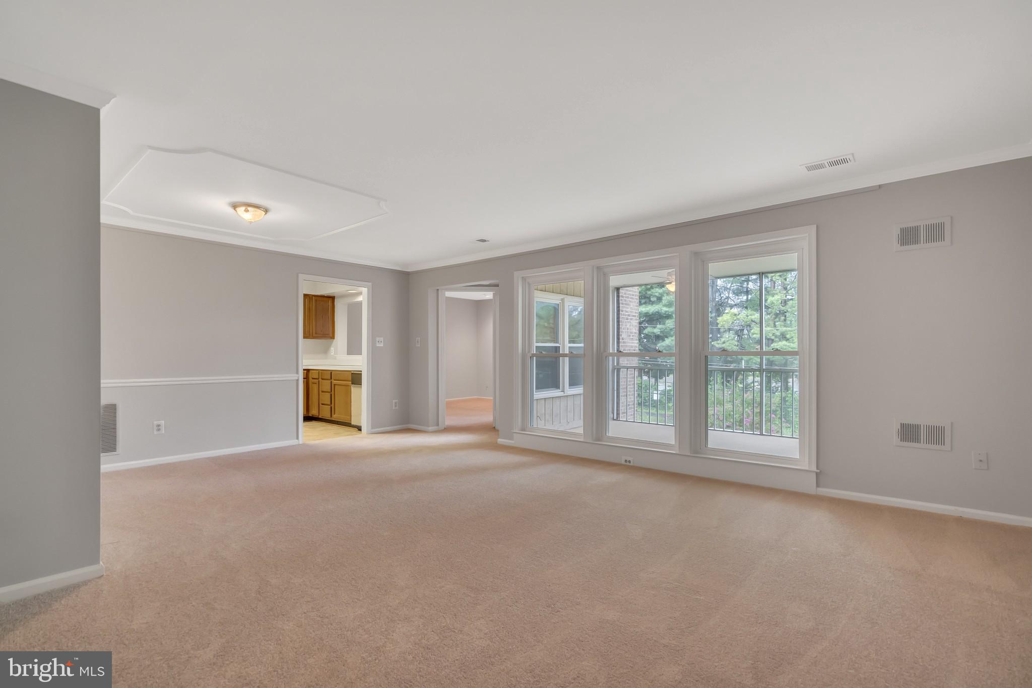 10717 Kings Riding Way, Unit 202 Rockville, MD 20852 - Photo 5 of 34 View of living room from foyer