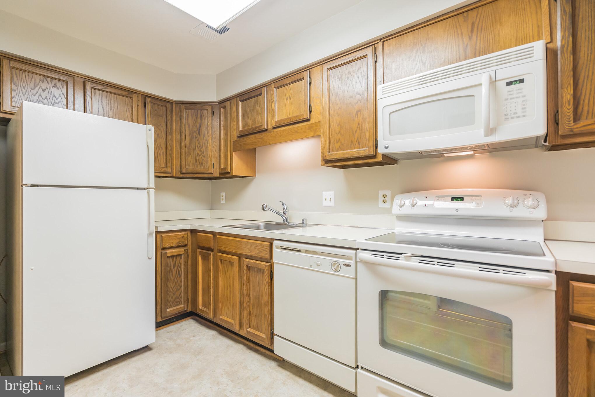 10717 Kings Riding Way, Unit 202 Rockville, MD 20852 - Photo 9 of 34 Bright and clean kitchen