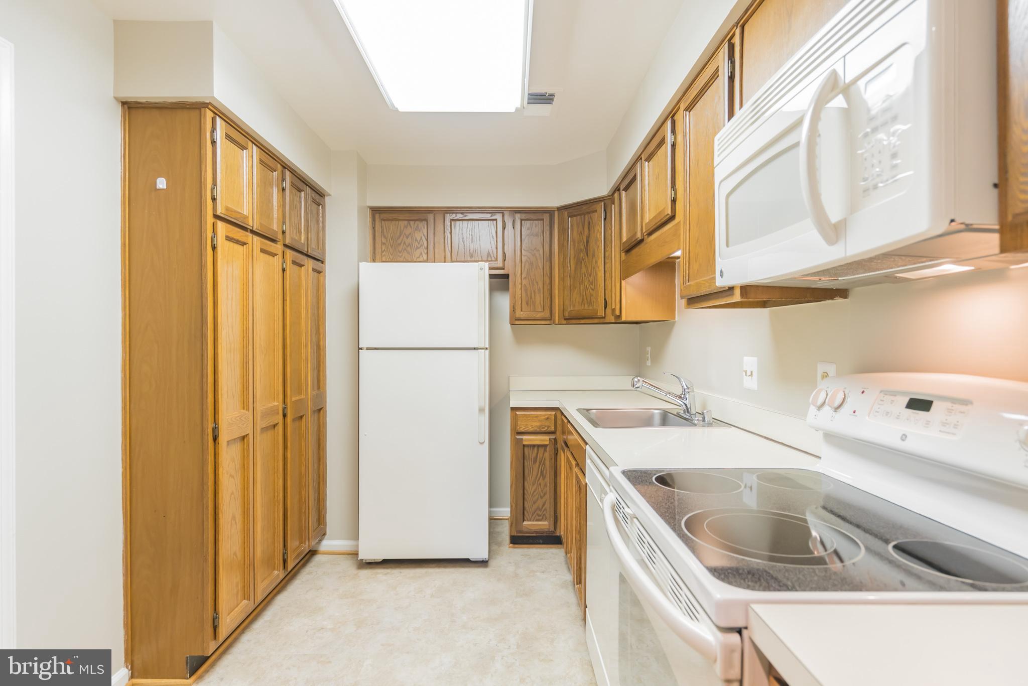 10717 Kings Riding Way, Unit 202 Rockville, MD 20852 - Photo 10 of 34 Plenty of cabinet and counter space