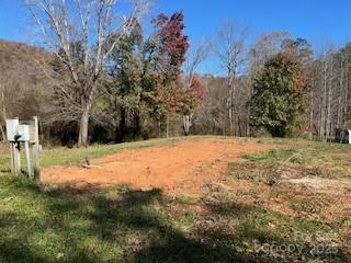418 Owl Hollow Road Marion, NC 28752 - Photo 3 of 9 a yard with a house in the background