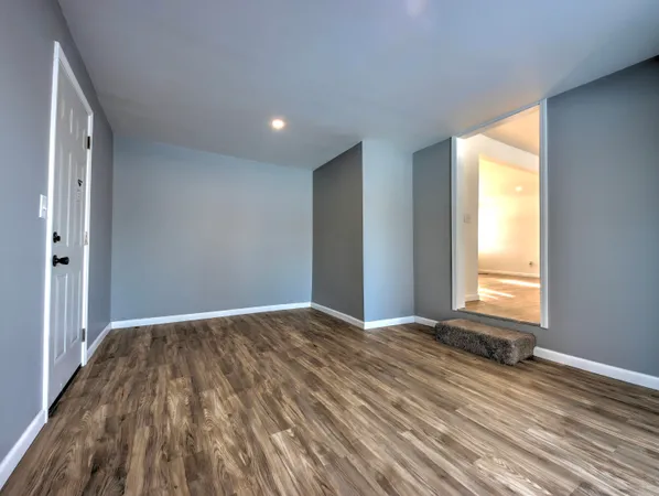 a view of an empty room and window