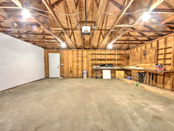a view of an empty room with a sink