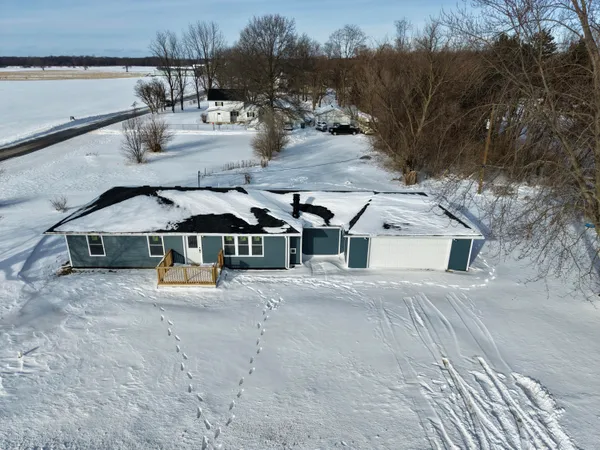 an arial view of a house with outdoor space