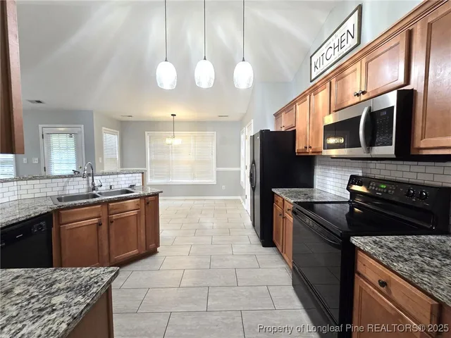 a view of deck with wooden floor and fence