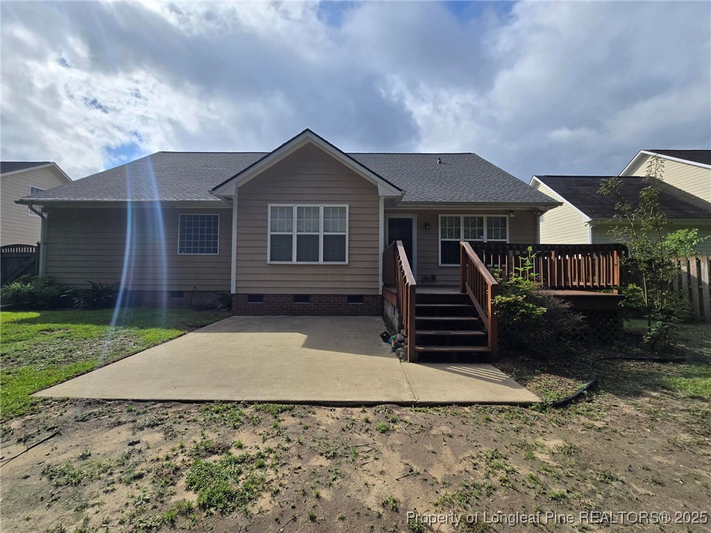 4158 Redspire Lane Fayetteville, NC 28306 - Photo 19 of 34 a front view of a house with a yard