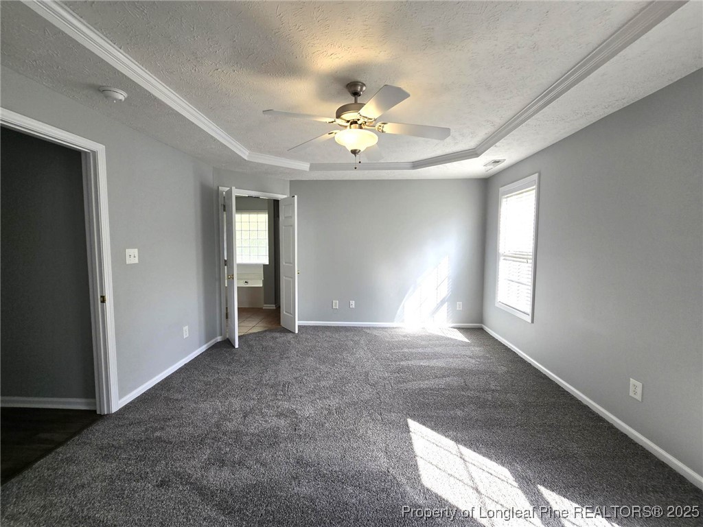 4158 Redspire Lane Fayetteville, NC 28306 - Photo 21 of 34 wooden floor in an empty room with a window