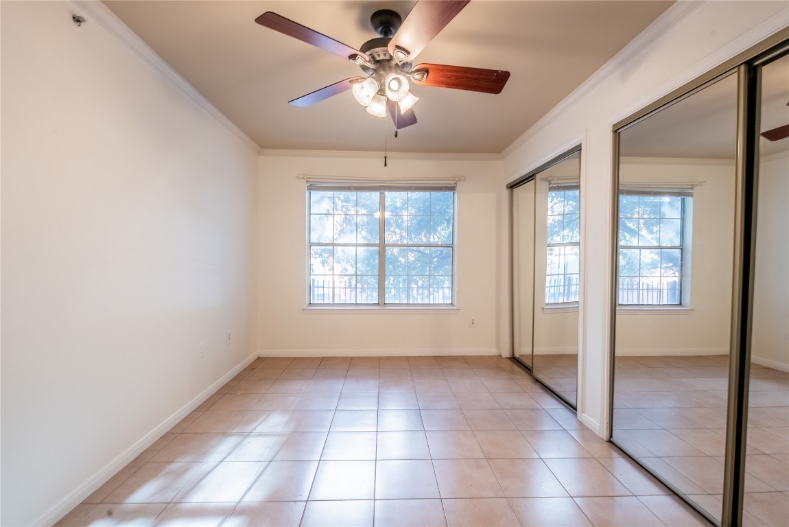 501 West 26th Street, Unit 106 Austin, TX 78705 - Photo 9 of 13 a view of an empty room with a window