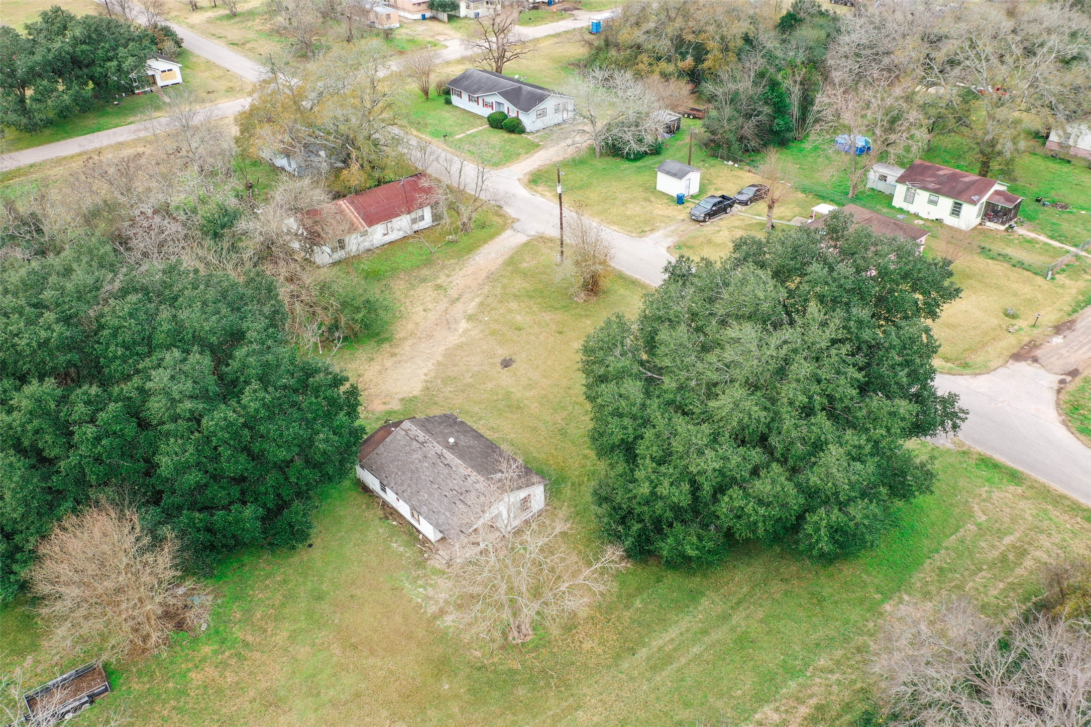 Tbd 17th Street Hempstead, TX 77445 - Photo 6 of 11 an aerial view of residential house with outdoor space and trees all around