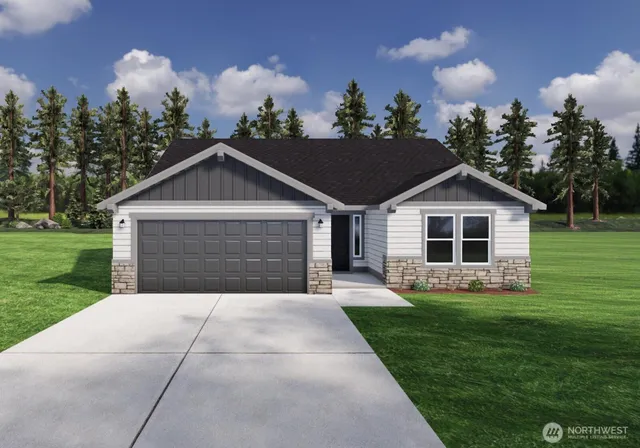 a front view of house with yard and green space