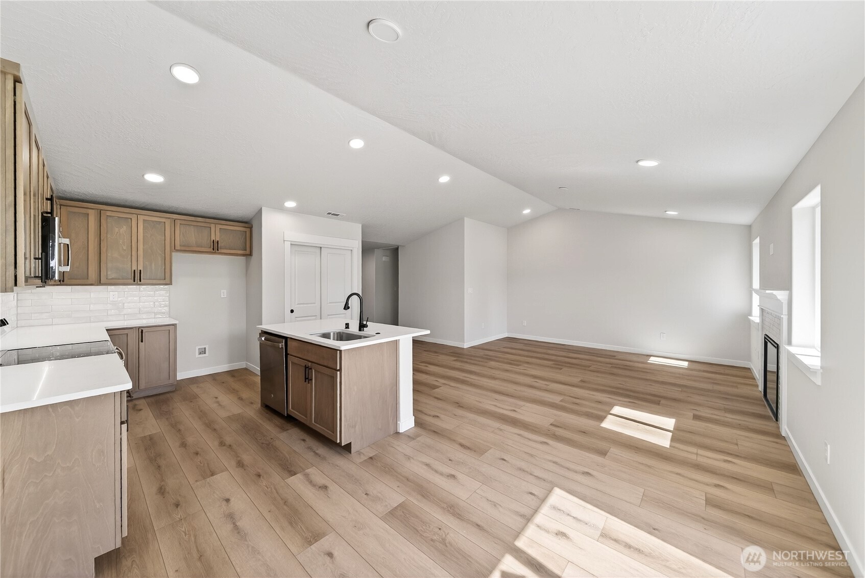 783 Ava Street Walla Walla, WA 99362 - Photo 4 of 12 a large kitchen with a lot of counter space and wooden floor