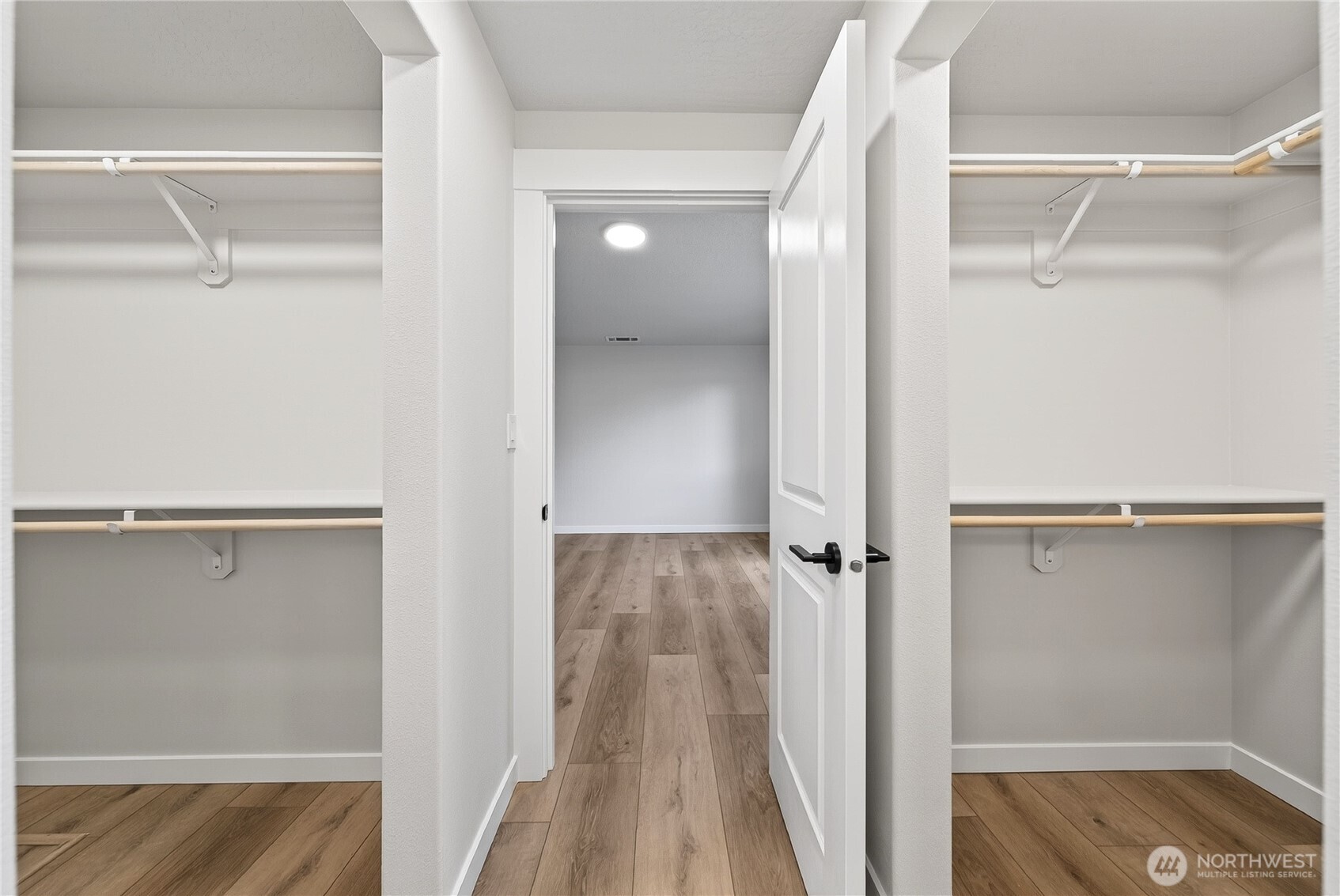783 Ava Street Walla Walla, WA 99362 - Photo 8 of 12 a view of walk in closet with wooden floor