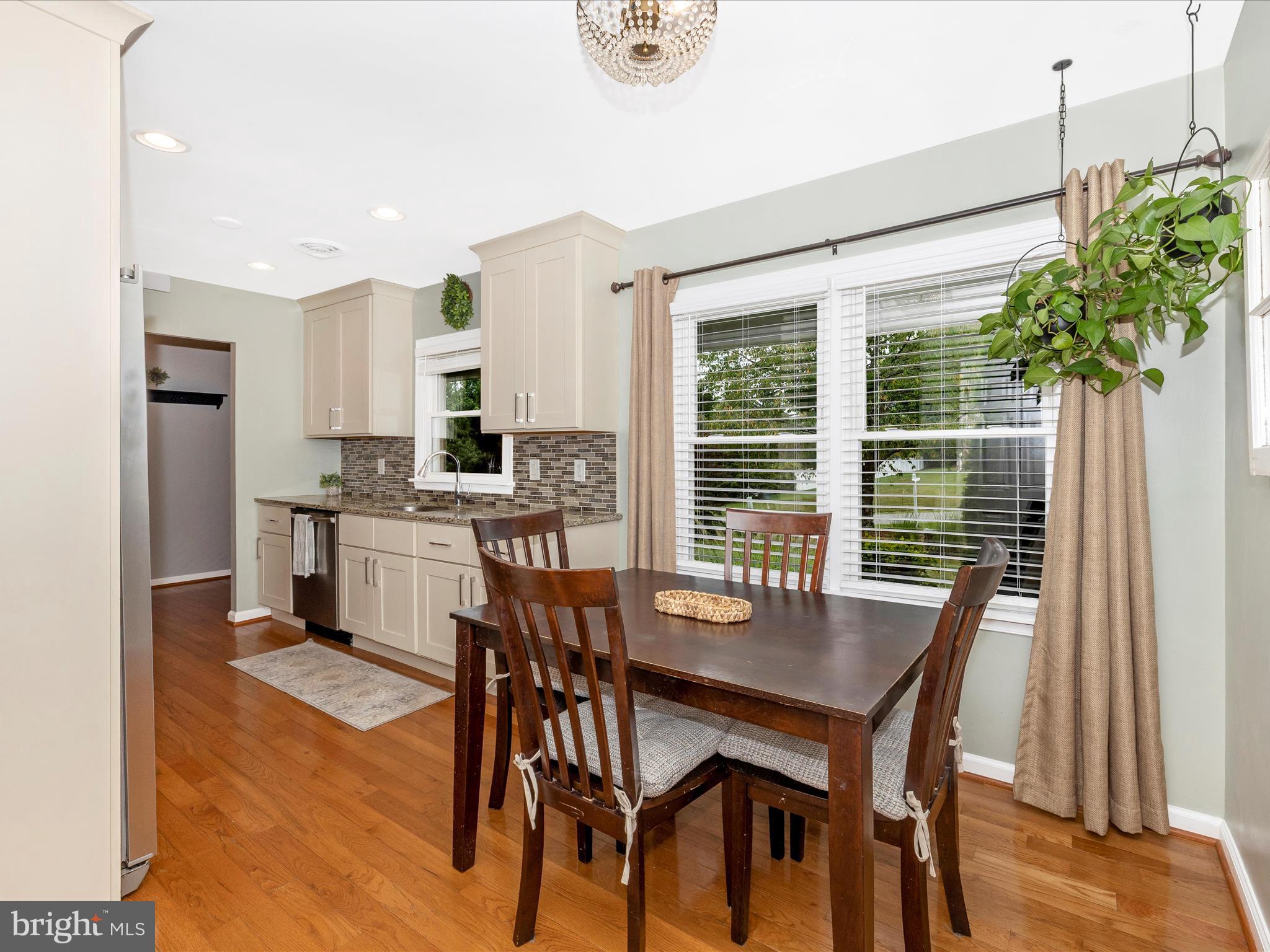 9204 Oak Tree Circle Frederick, MD 21701 - Photo 18 of 58 a dining room with furniture and window