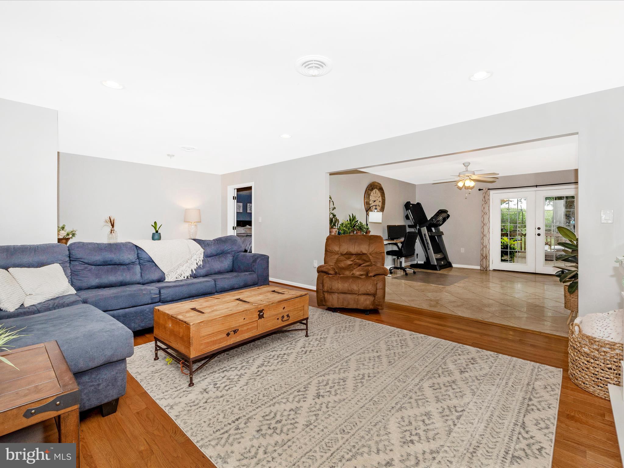 9204 Oak Tree Circle Frederick, MD 21701 - Photo 2 of 58 a living room with furniture and a couch