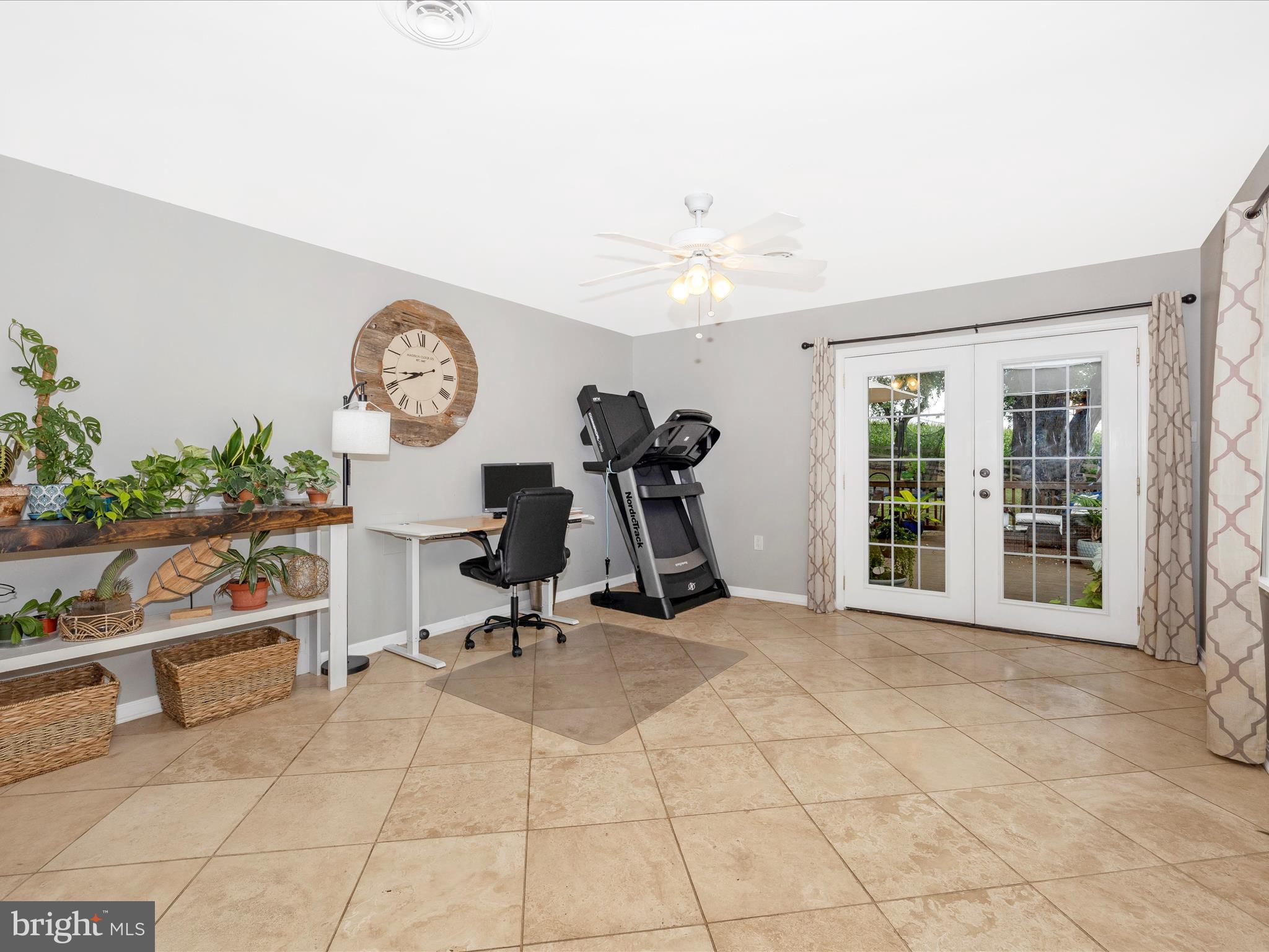 9204 Oak Tree Circle Frederick, MD 21701 - Photo 22 of 58 a view of a livingroom with furniture and a large window