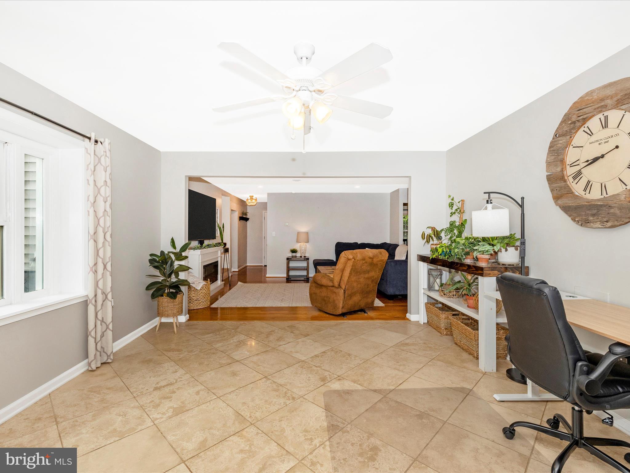9204 Oak Tree Circle Frederick, MD 21701 - Photo 24 of 58 a view of a livingroom with workspace and a window
