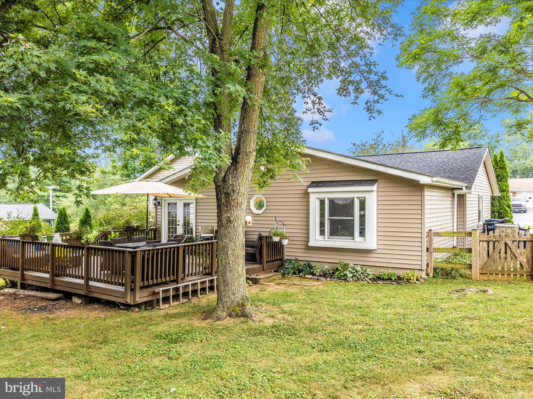 9204 Oak Tree Circle Frederick, MD 21701 - Photo 52 of 58 a view of a house with backyard and a tree
