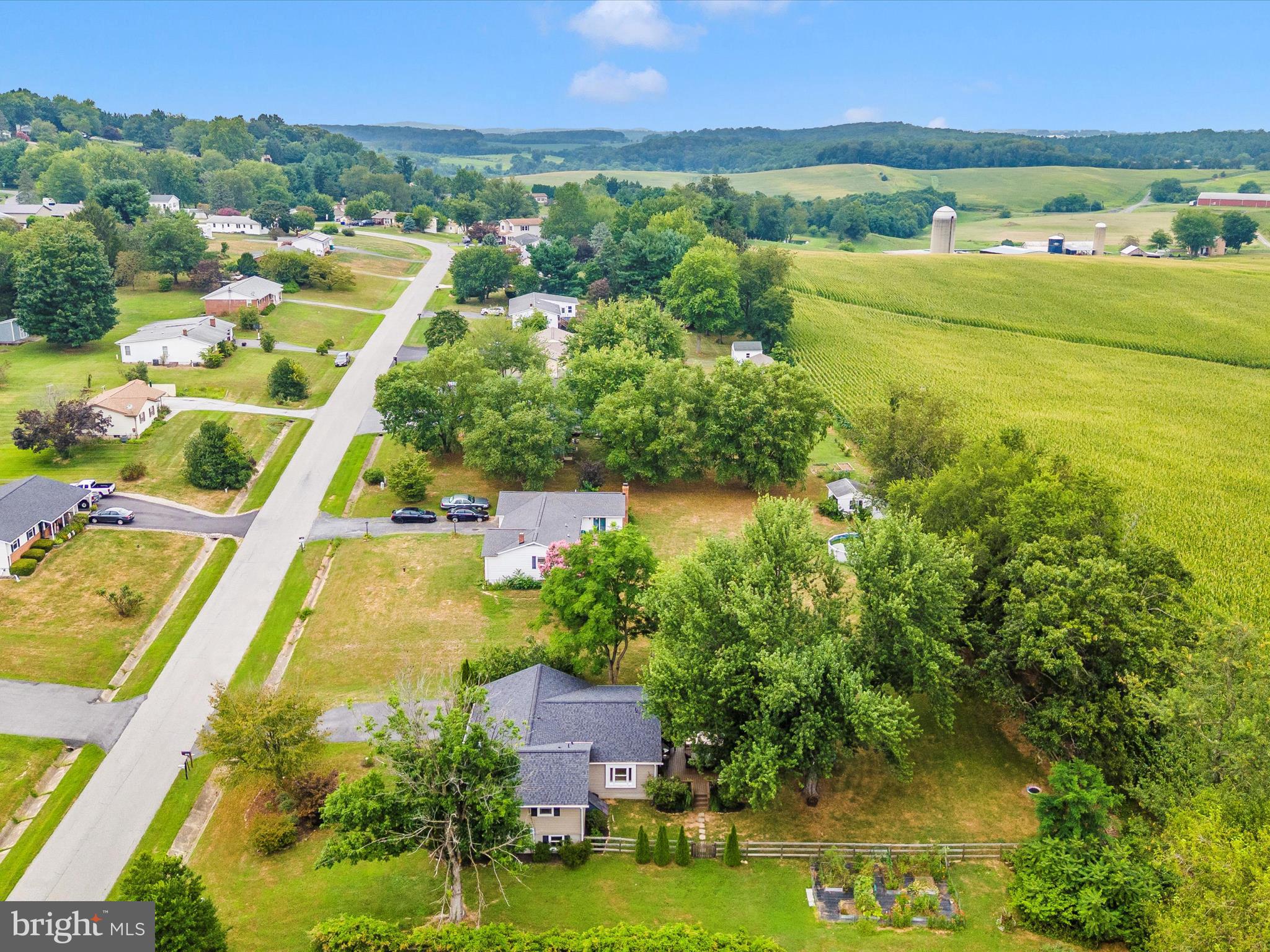 9204 Oak Tree Circle Frederick, MD 21701 - Photo 56 of 58 a view of a city with lawn chairs