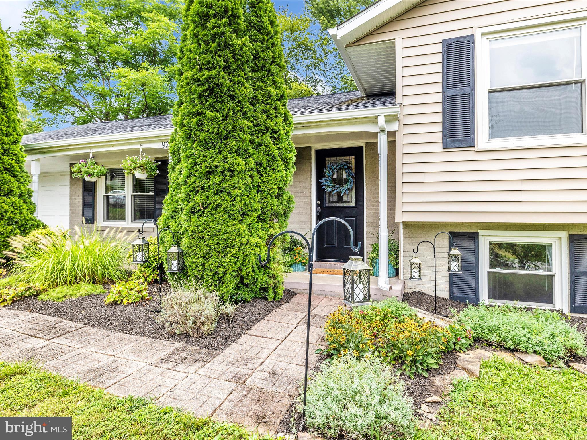 9204 Oak Tree Circle Frederick, MD 21701 - Photo 9 of 58 a house view with a outdoor space