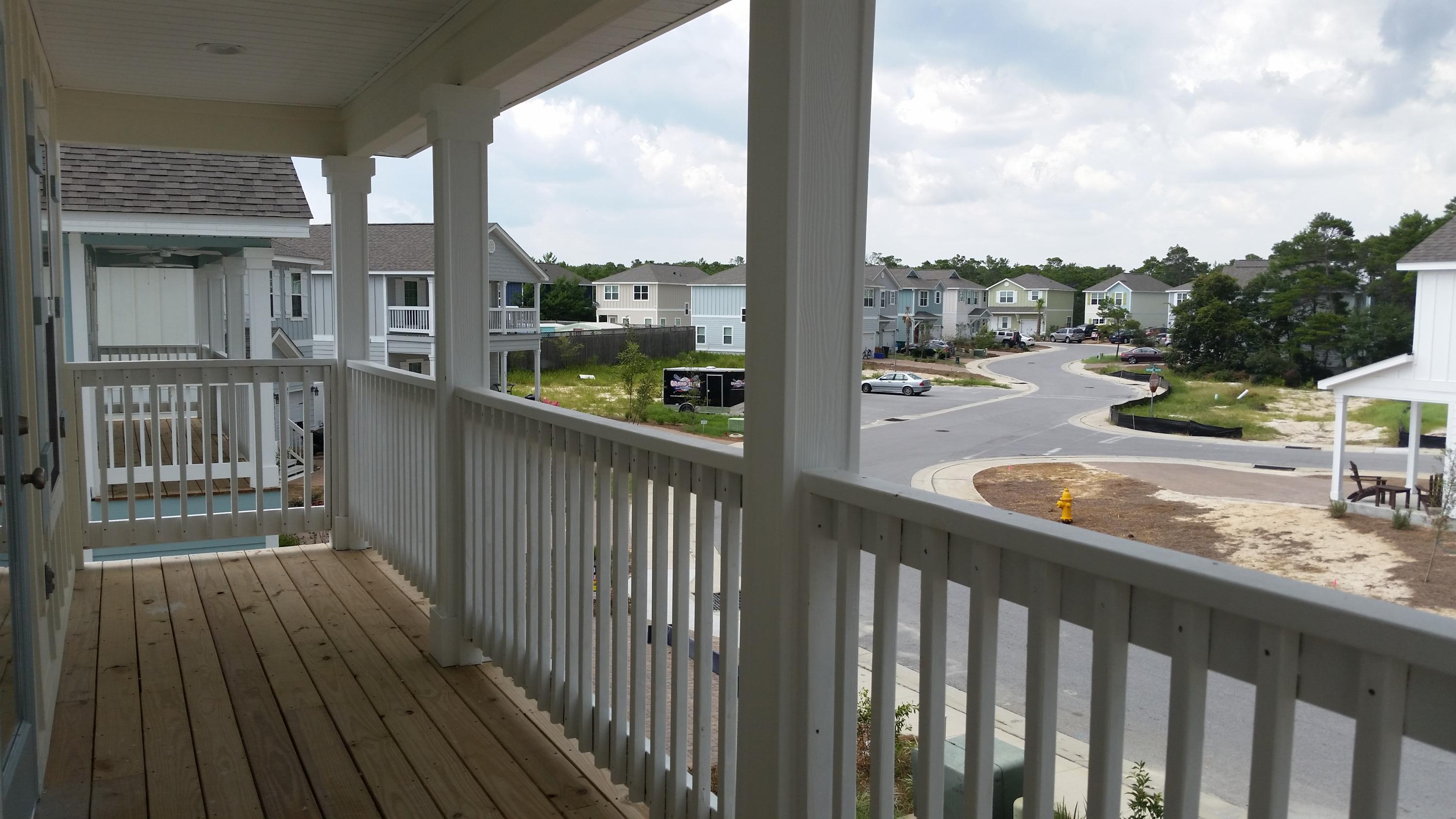65 Grayling Way Inlet Beach, FL 32461 - Photo 20 of 36 a view of a balcony with wooden floor