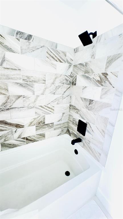 14614 Bayonne Road Orlando, FL 32832 - Photo 14 of 23 a bathroom with a sink