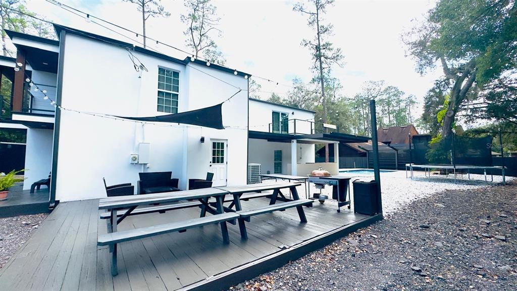 14614 Bayonne Road Orlando, FL 32832 - Photo 3 of 23 a swimming pool view with a outdoor seating