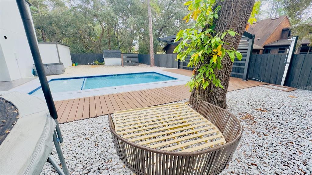 14614 Bayonne Road Orlando, FL 32832 - Photo 6 of 23 a view of balcony with wooden floor and outdoor seating