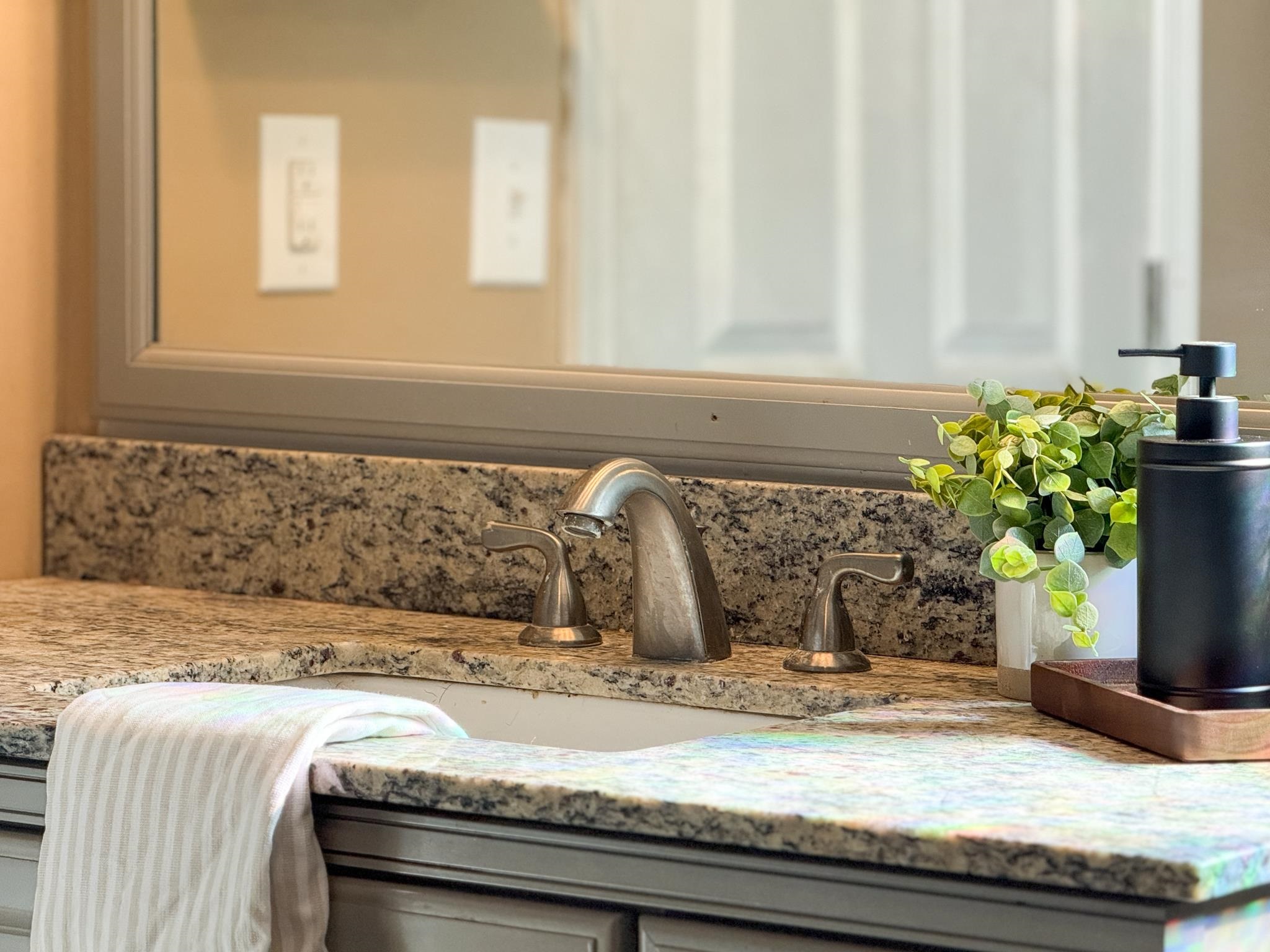 13 Indian Ridge Road Greenville, VA 24440 - Photo 12 of 17 a bathroom with a granite countertop sink and a granite