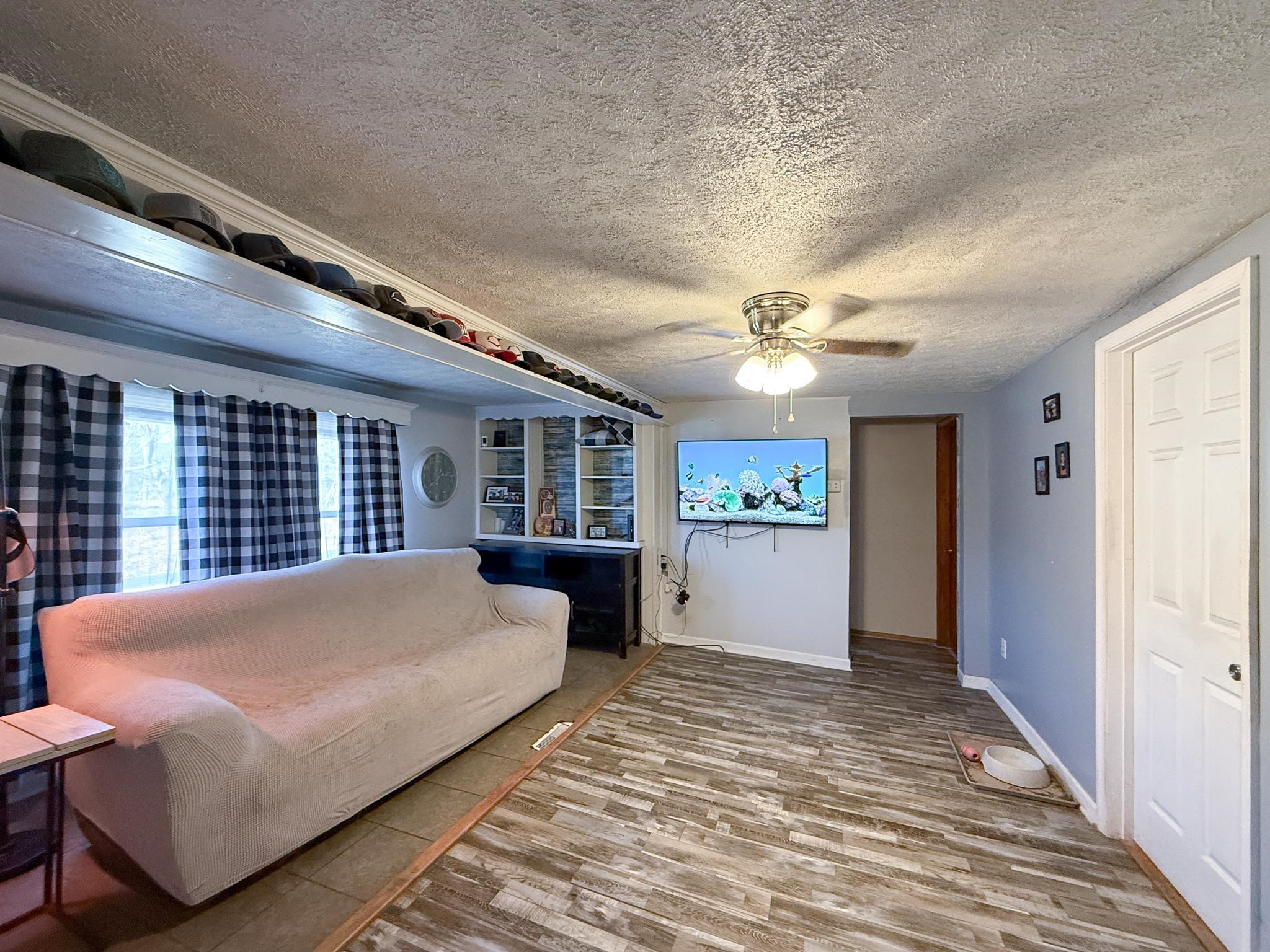 13 Indian Ridge Road Greenville, VA 24440 - Photo 9 of 17 a large bedroom with a large bed and a large window