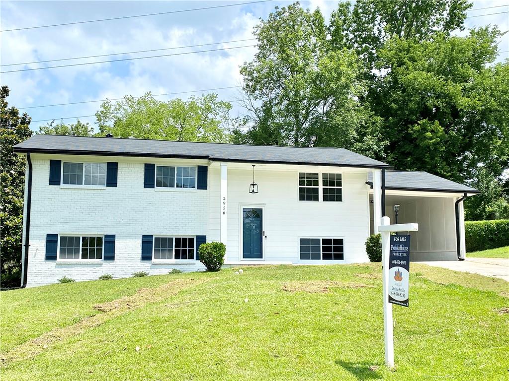 2926 Fairburn Road Southwest Atlanta, GA 30331 - Photo 1 of 1 a view of a house with a swimming pool