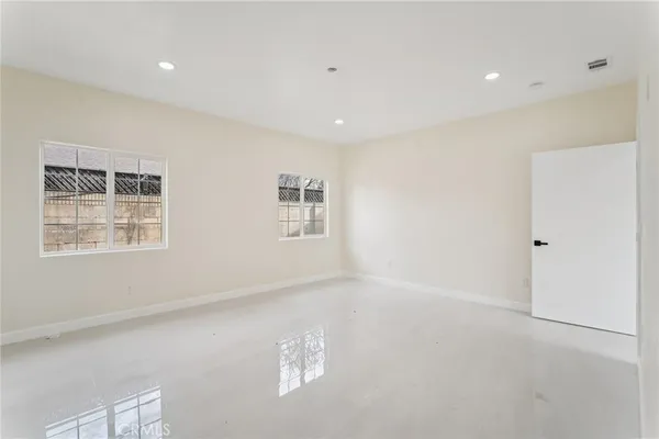 an empty room with windows