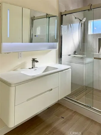 a view of a livingroom with a sink and a dishwasher