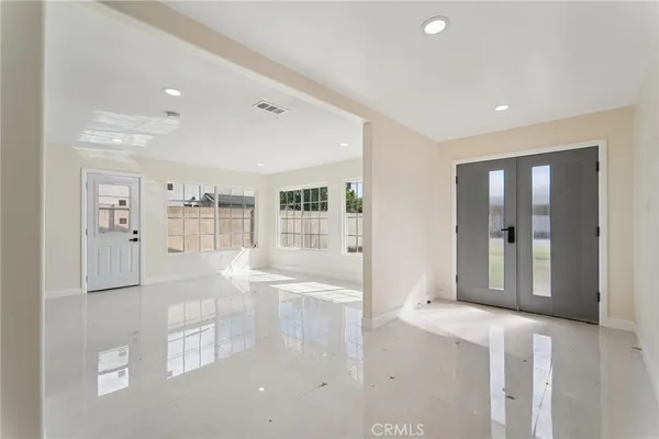 an empty room with windows