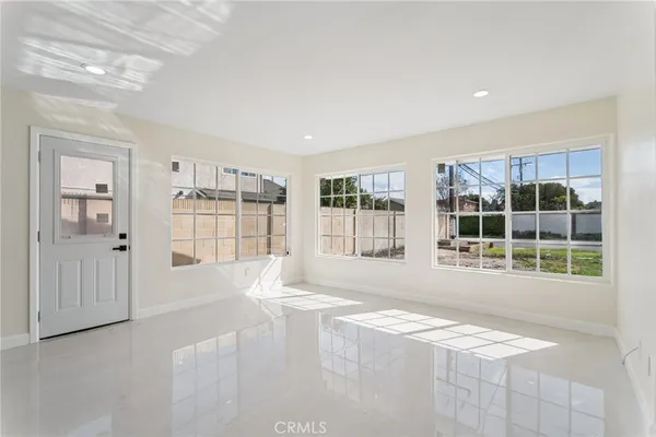 a kitchen with stainless steel appliances granite countertop a stove and a sink