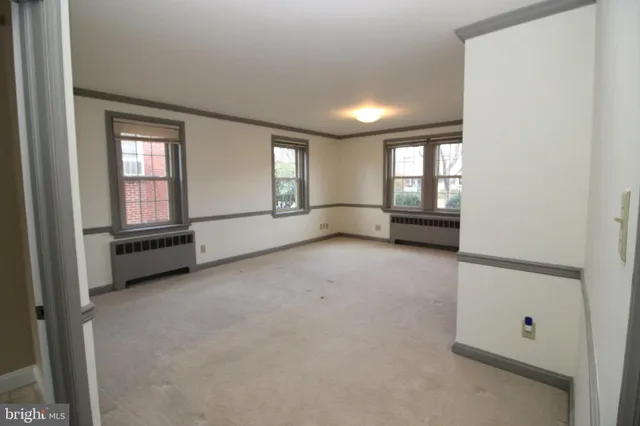 an empty room with windows