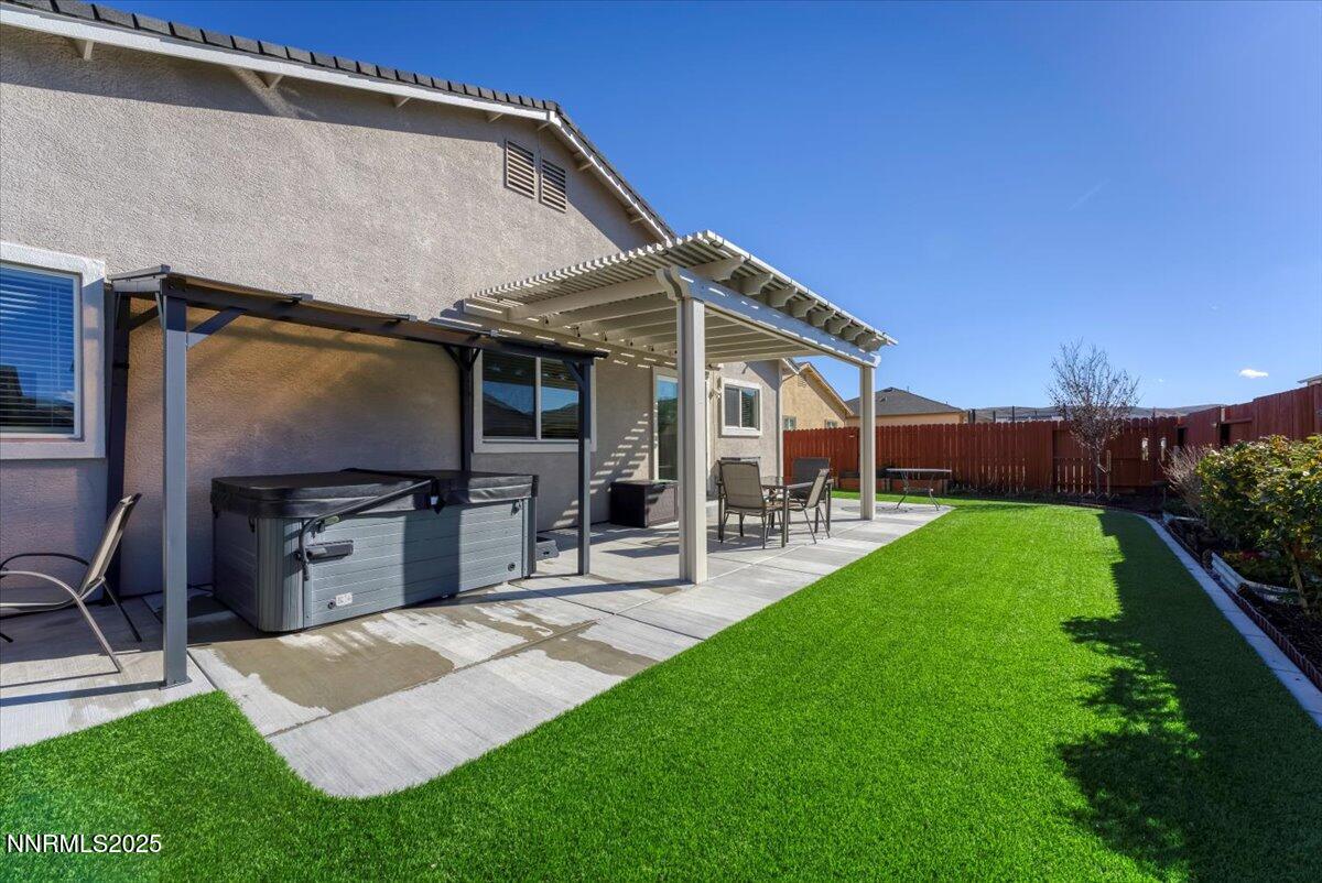 18722 Knott Crk Court Reno, NV 89508 - Photo 32 of 56 a view of a house with backyard porch and sitting area