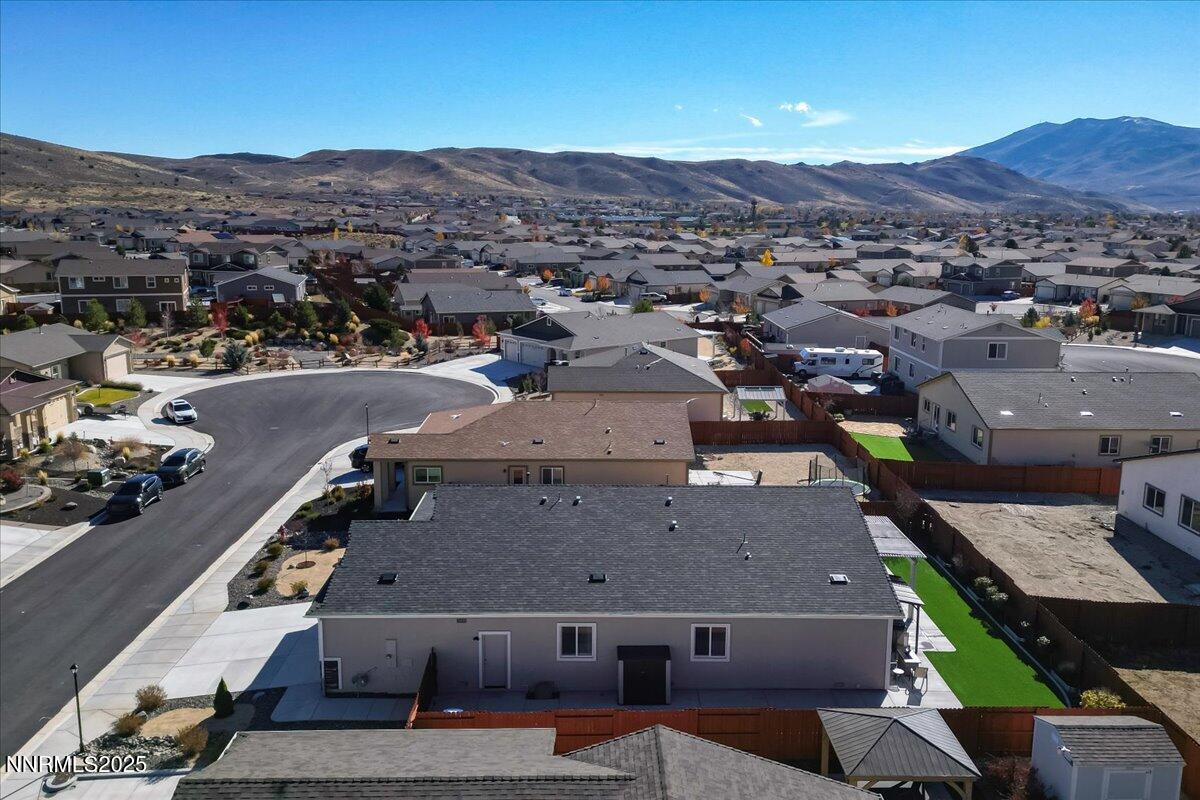 18722 Knott Crk Court Reno, NV 89508 - Photo 38 of 56 an aerial view of a house with a mountain view