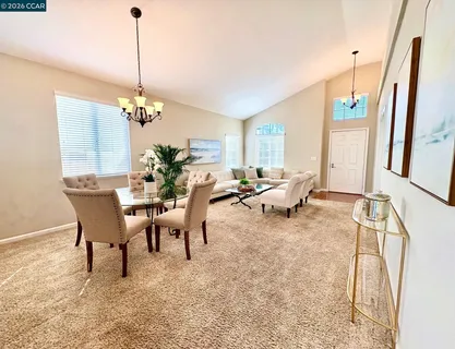 a view of a dining room and livingroom