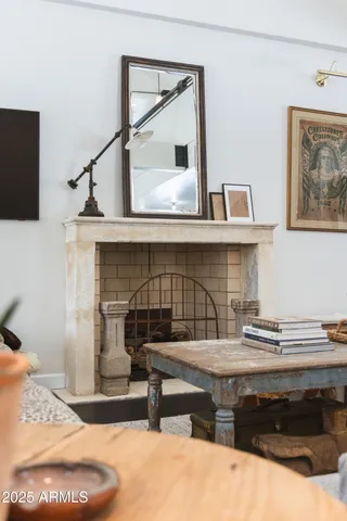 a living room with furniture and a table