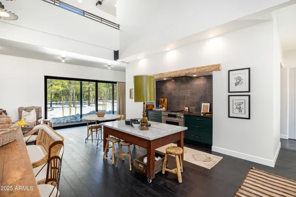 a bedroom with furniture and a chandelier